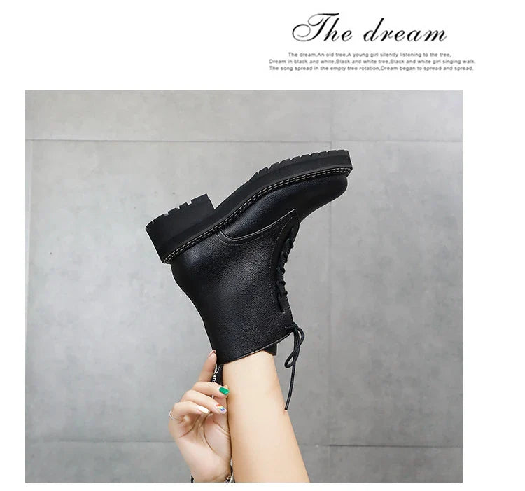 Stylish women's platform locomotive boots with leather upper and rubber sole, in black and cotton black colors
