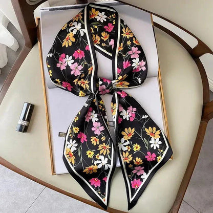 Elegant floral print scarf in soft, cotton-like polyester fabric - a versatile Kiwi accessory for year-round style