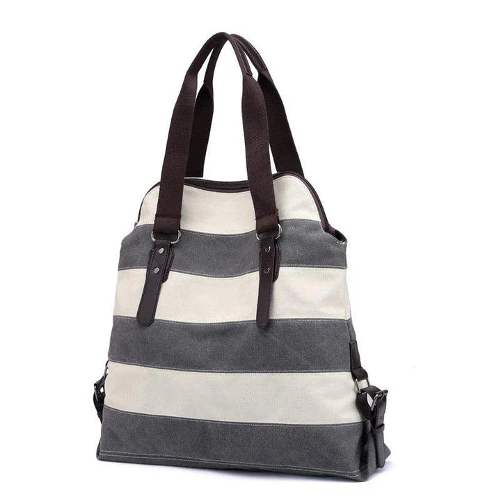 Stylish and practical Kiwi-crafted canvas tote bag with roomy interior, durable polyester lining, and adjustable shoulder straps