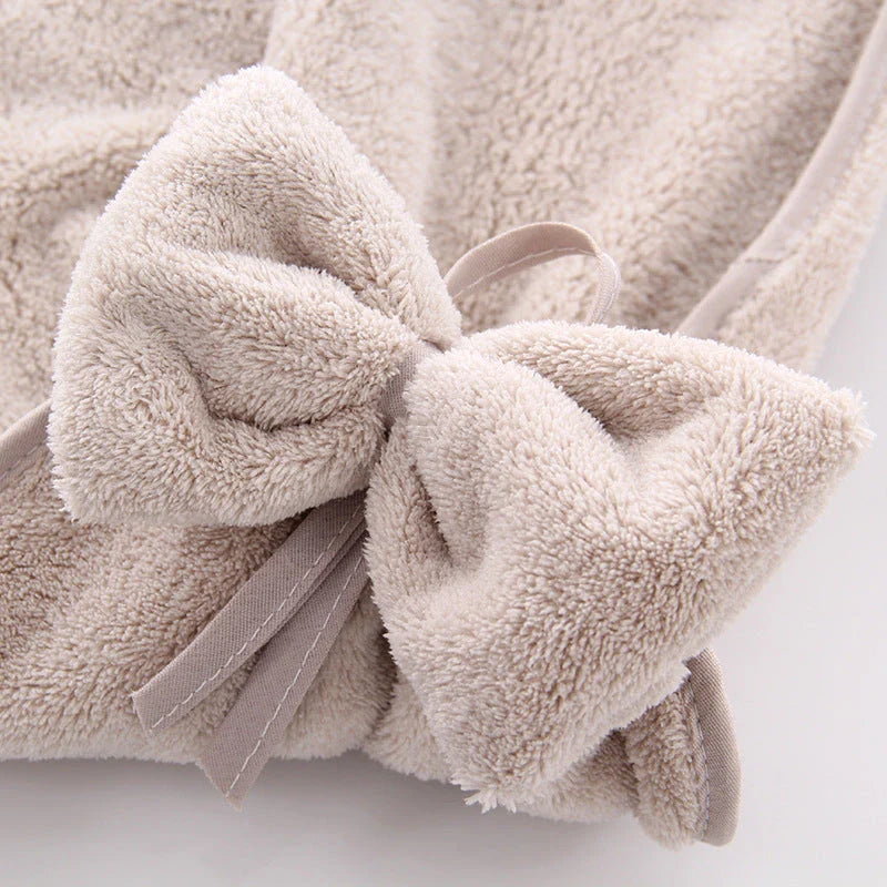 Soft, absorbent coral velvet hand towels with a unique bow design, perfect for Kiwi homes