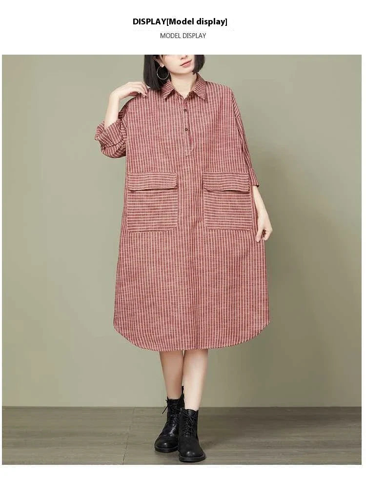 Plus-size women's dress with striped pattern, asymmetric skirt, and long sleeves