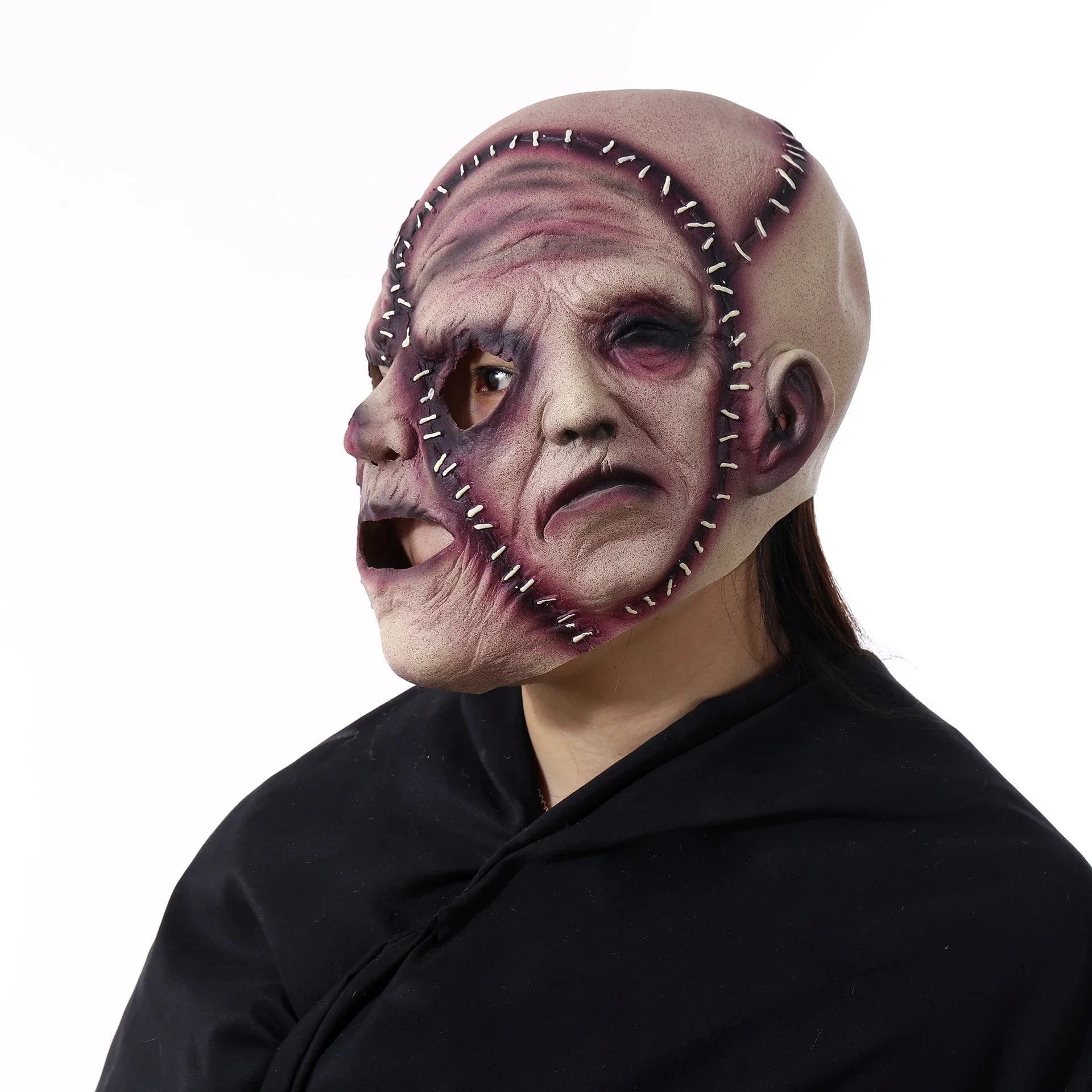 A realistic three-sided horror mask crafted from 100% natural latex, perfect for Kiwi Halloween and costume parties.