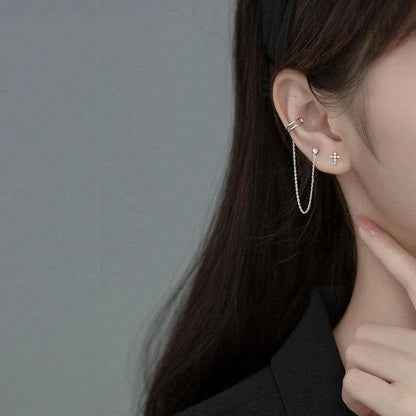 Unique one-piece sterling silver earring and ear clip set designed by New Zealand artist Xia Chunyin