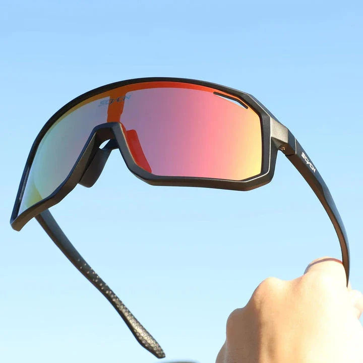 Rugged multi-sport sunglasses with UV400 polycarbonate lenses, perfect for outdoor activities like cycling, hiking, and driving in New Zealand