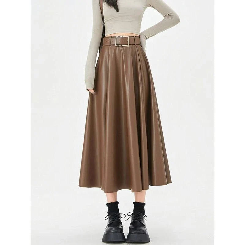 Elegant high-waist faux leather skirt with stylish belt, perfect for office or casual wear