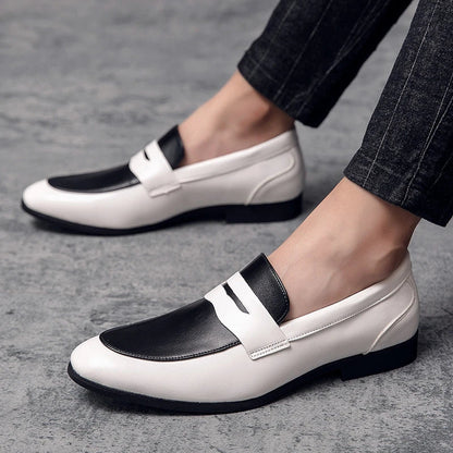 Sleek, stylish leather shoes in white and black with a modern, low-profile design suitable for business and formal occasions