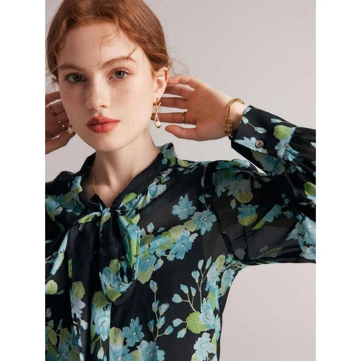 Elegant floral silk blend blouse with puff sleeves and bow collar, a timeless fashion statement for Kiwi women