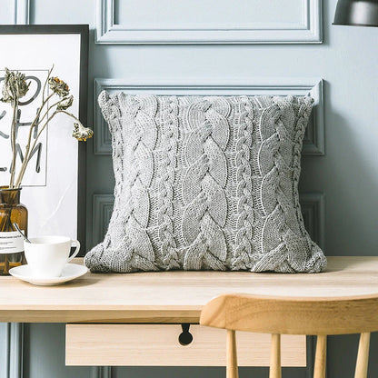 Elegant grey knitted decorative pillow case with intricate jacquard pattern and embroidered stripes