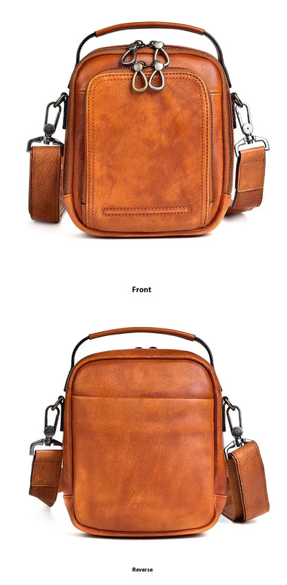 A rugged, retro-inspired cowhide messenger bag made in New Zealand, featuring a spacious interior, multiple pockets, and a comfortable single strap design.