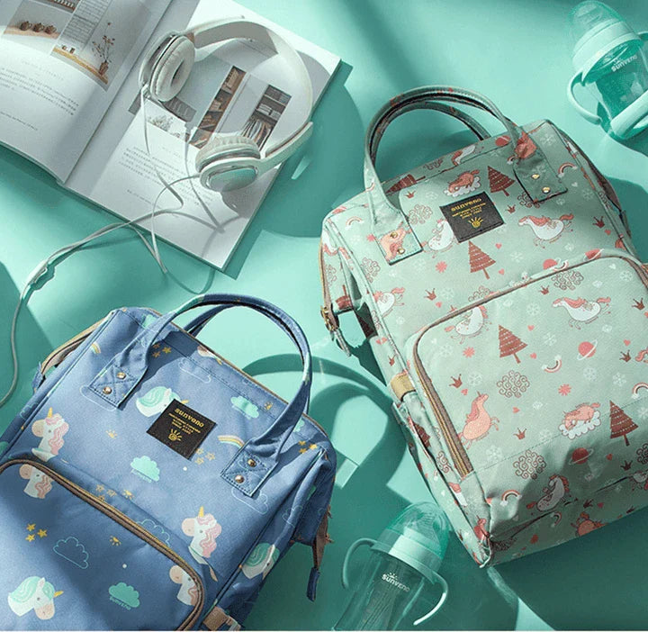 Stylish and practical mummy bag with reinforced handles, durable buckles, and separate bottling area for Kiwi mums