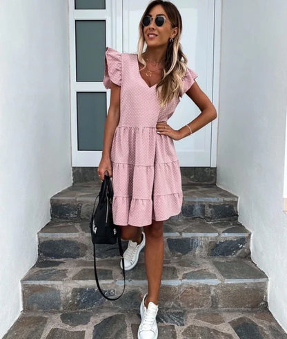 Vibrant digital print V-neck dress with ruffled detailing and flowing silhouette