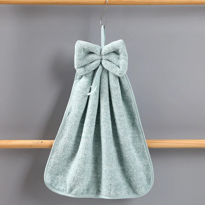 Soft, absorbent coral velvet hand towels with a unique bow design, perfect for Kiwi homes