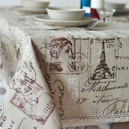 Elegant Paris-themed cotton and linen tablecloth with a delicate pattern, perfect for transforming your dining space