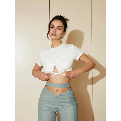 Stylish white crop top with crisscross tie-back design, perfect for Kiwi fashion enthusiasts