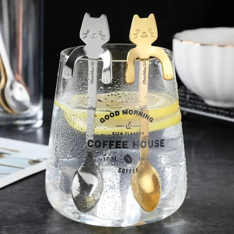 Charming cat-shaped stainless steel teaspoon with a sleek gold finish, perfect for Kiwi kitchens