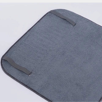 A modern, gray dish drying rack with convenient storage space for kitchen essentials, designed to declutter and streamline your Kiwi kitchen