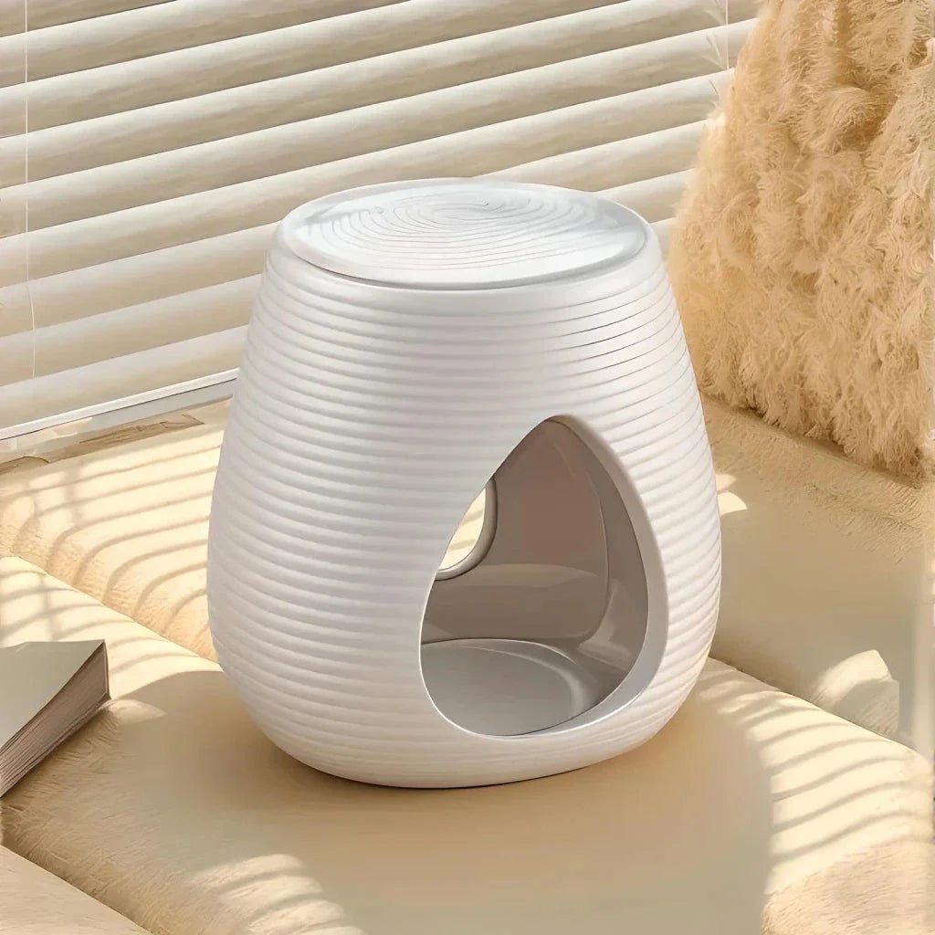 Elegant porcelain aroma diffuser in white and black colours, perfect for creating a relaxing atmosphere in your New Zealand home