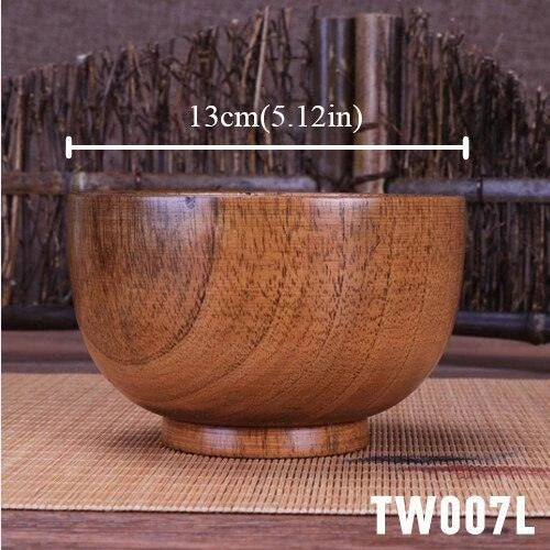 A large, round wooden soup bowl with a warm, natural brown color, perfect for serving hearty meals in Kiwi kitchens.