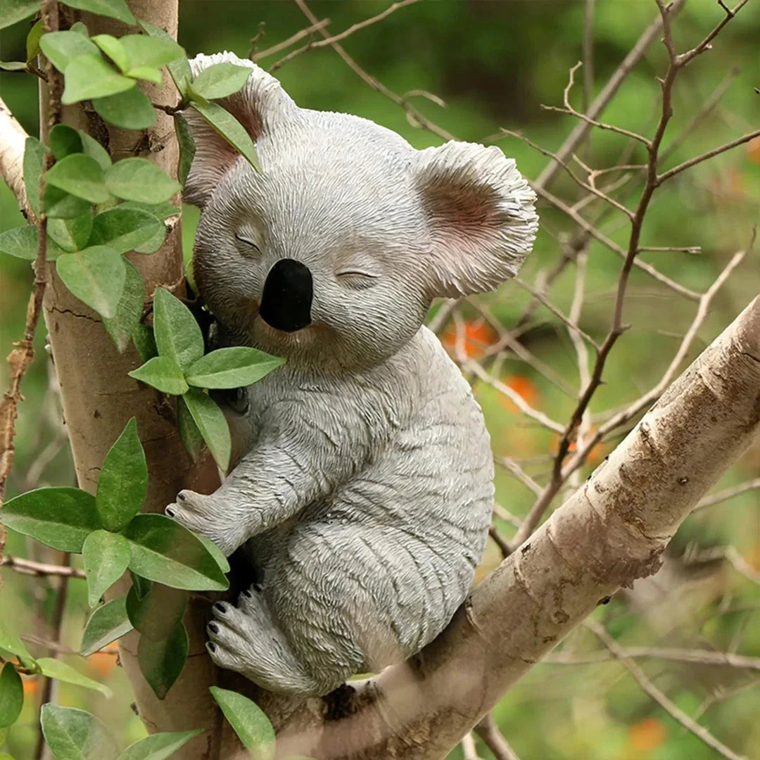 A charming and realistic outdoor koala statue made of high-quality resin, perfect for decorating Kiwi gardens and backyards.