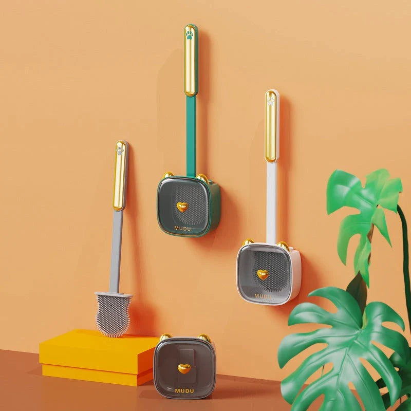 Stylish cat-themed wall-mounted toilet brush set with flexible silicone bristles for efficient cleaning in the Kiwi bathroom