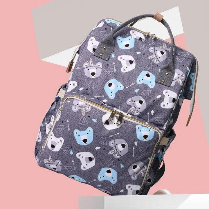 Stylish Kiwi Mummy Backpack in black, navy, and grey colours with spacious interior, multiple pockets, and comfortable straps