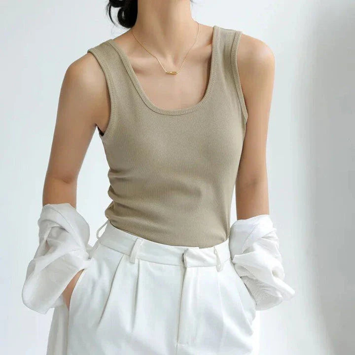 Stylish and versatile solid color tank top with chic strap detail, perfect for Kiwi summer fashion