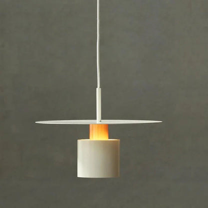 A modern, minimalist pendant light with a sleek, painted metal design, perfect for enhancing the ambiance of cafes, bedrooms, and other contemporary interior spaces.