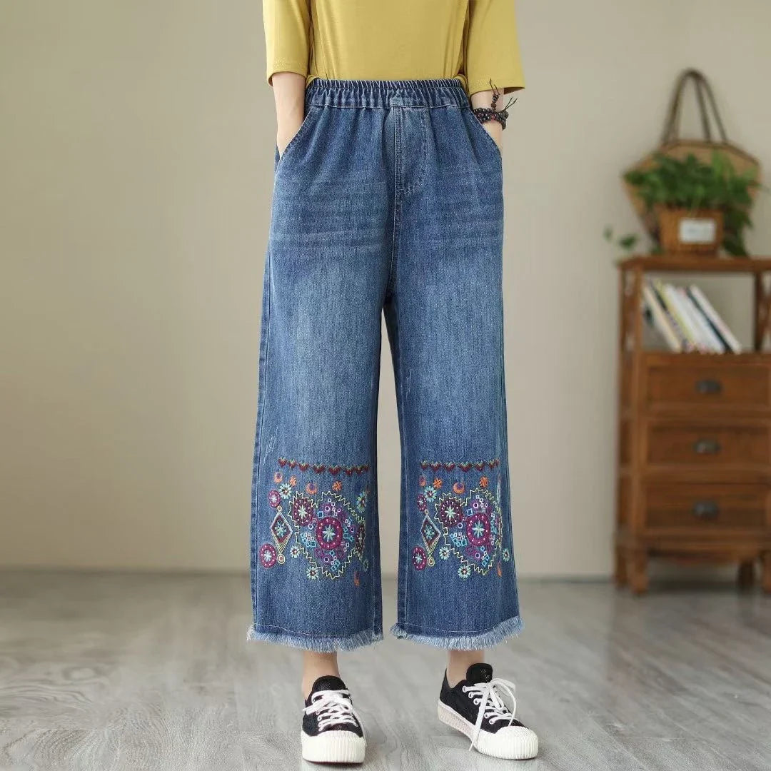 Embroidered denim jeans with distressed details, perfect for the modern Kiwi lifestyle