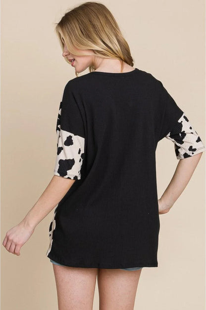 Stylish cow-print tee with ribbed fabric for Kiwi ladies, perfect for casual outings or night out with friends