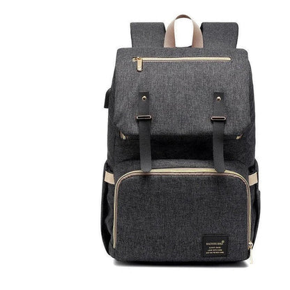 Versatile Mummy Daddy Backpack in Grey, a functional and stylish nappy bag for Kiwi families with a spacious main compartment, insulated pockets, and a USB charging port.