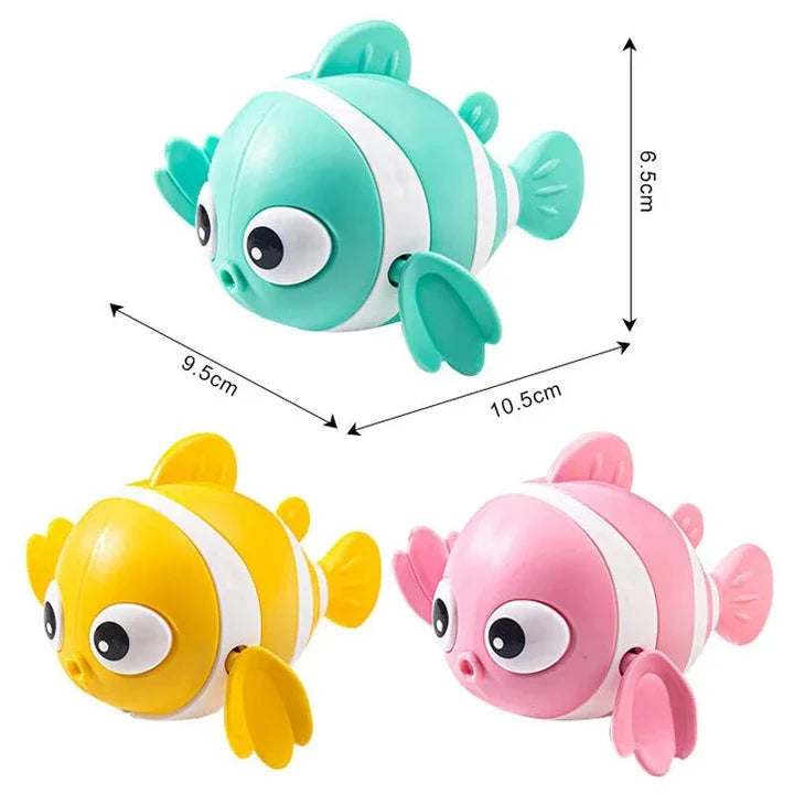 Cartoon fish wind-up bath toy in green, designed for New Zealand toddlers to enjoy during bathtime