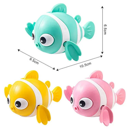 Cartoon fish wind-up bath toy in green, designed for New Zealand toddlers to enjoy during bathtime