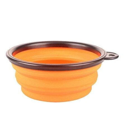 Foldable silicone dog bowl in red color, perfect for outdoor activities with Kiwi canine companions