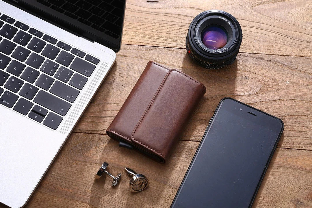 A stylish tri-fold wallet in classic Kiwi-friendly colours, featuring a magnetic buckle closure, anti-theft protection, and a sleek square vertical design