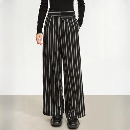 Elegant autumn wide-leg striped trousers for women in a classic black and white pattern