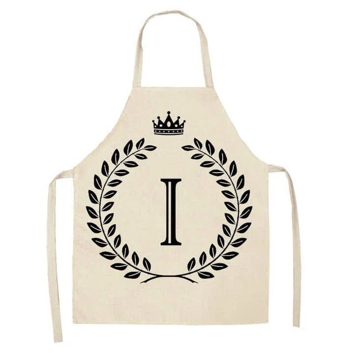 A crown and letter printed kitchen apron made of high-quality cotton and linen, suitable for both men and women in New Zealand kitchens.