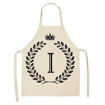 A crown and letter printed kitchen apron made of high-quality cotton and linen, suitable for both men and women in New Zealand kitchens.