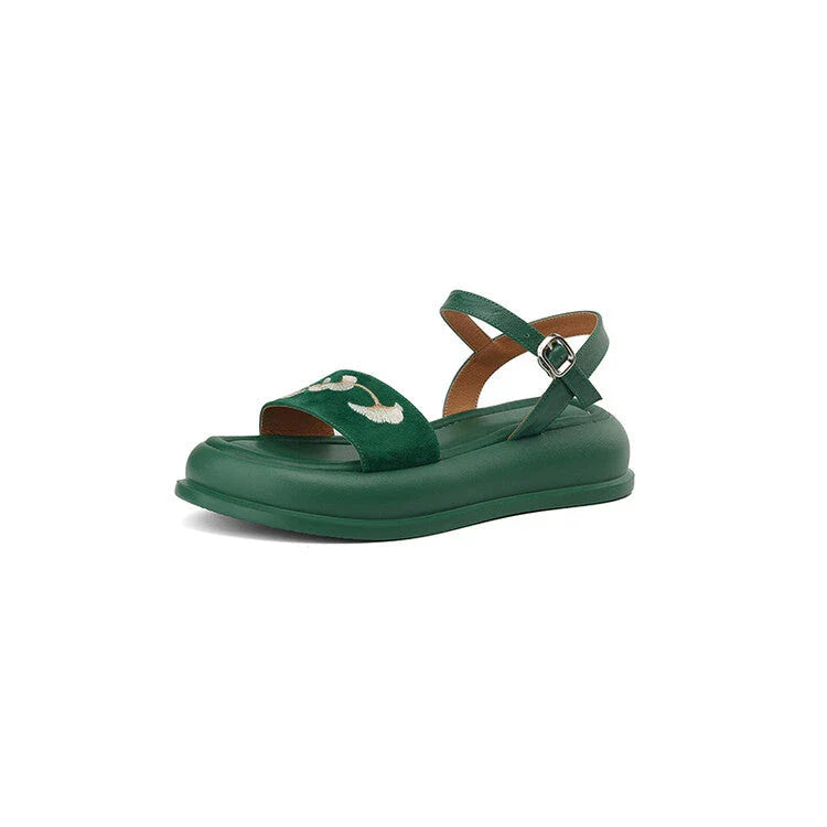 Embroidered platform sandals with kid suede upper and durable TPU outsole, designed for everyday comfort and style.