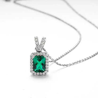 Gleaming emerald clavicle necklace with 925 sterling silver chain and adjustable length