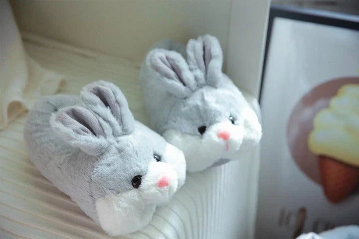 Pair of plush rabbit-inspired home slippers in various colors, perfect for keeping feet warm during New Zealand winters