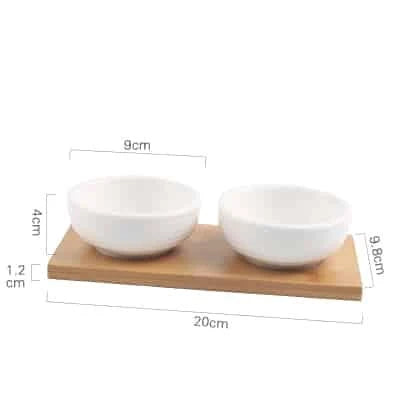 Stylish ceramic snack trays with natural wood pallet, perfect for serving nibbles and entertaining in Kiwi-style homes