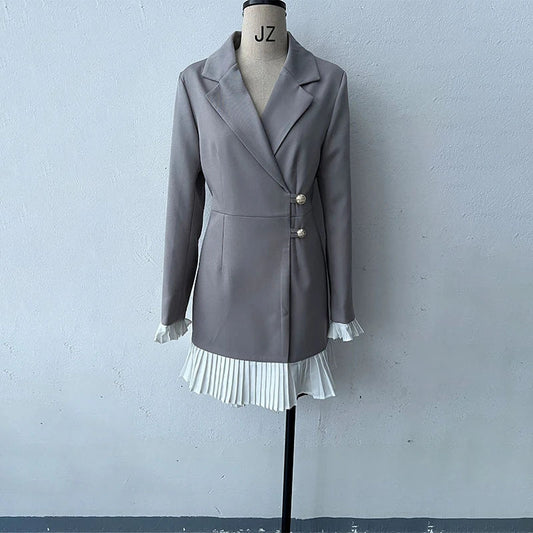 Stylish patchwork ruffled dress jacket made with sustainable viscose fibres, suitable for casual or smart-casual wear in New Zealand