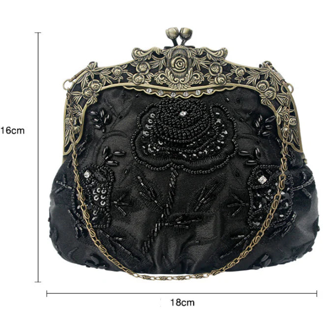 Bead embroidered fashion bag with silk surface, nylon exterior, and magnetic buckle closure