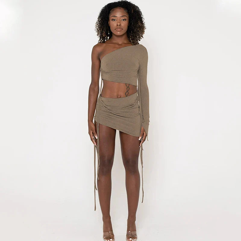 A stylish one-shoulder top and drawstring skirt set made from premium milk silk fabric, perfect for elevating your casual wardrobe.