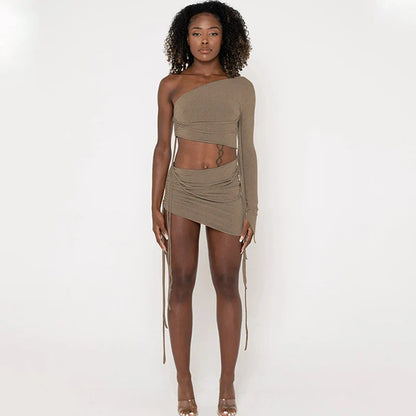 A stylish one-shoulder top and drawstring skirt set made from premium milk silk fabric, perfect for elevating your casual wardrobe.