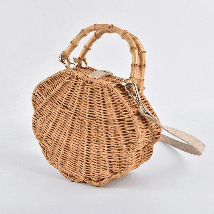 Rattan straw bag with intricate three-dimensional conch shell design, ideal for everyday use and a touch of coastal chic