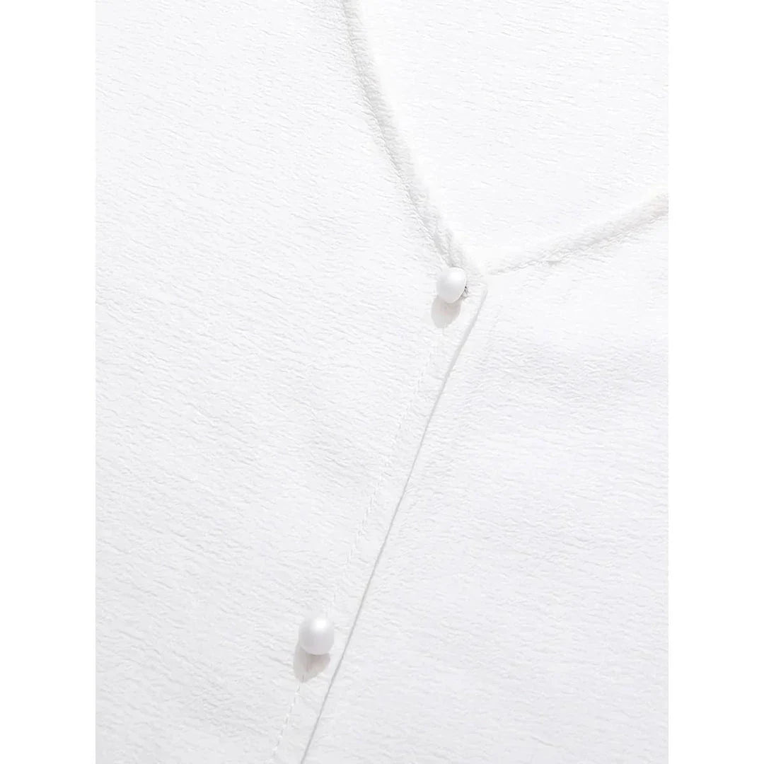 Elegant and versatile French-inspired women's blouse in a classic white color