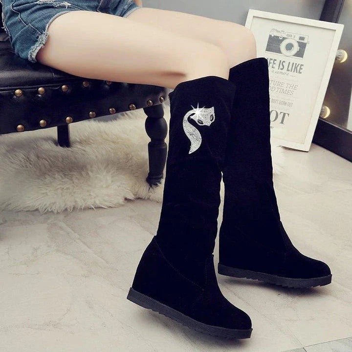 Pair of women's winter boots with rhinestone embellishments in a variety of black colour options