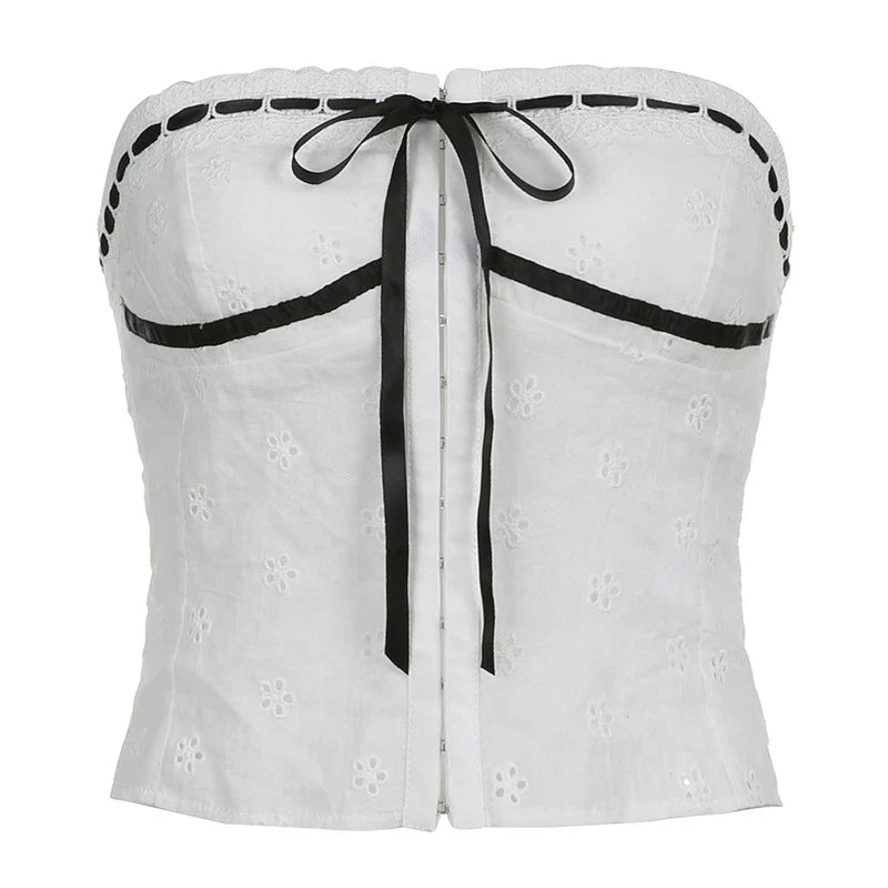A stylish white tube top with a lace-up design, perfect for adding a touch of Kiwi fashion flair to your wardrobe.
