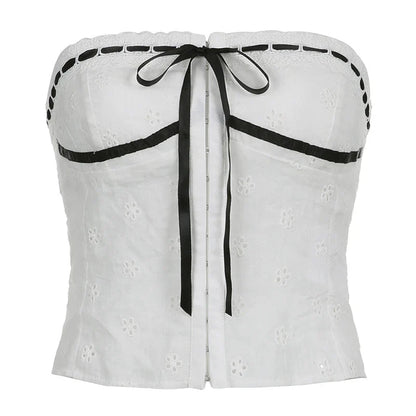 A stylish white tube top with a lace-up design, perfect for adding a touch of Kiwi fashion flair to your wardrobe.